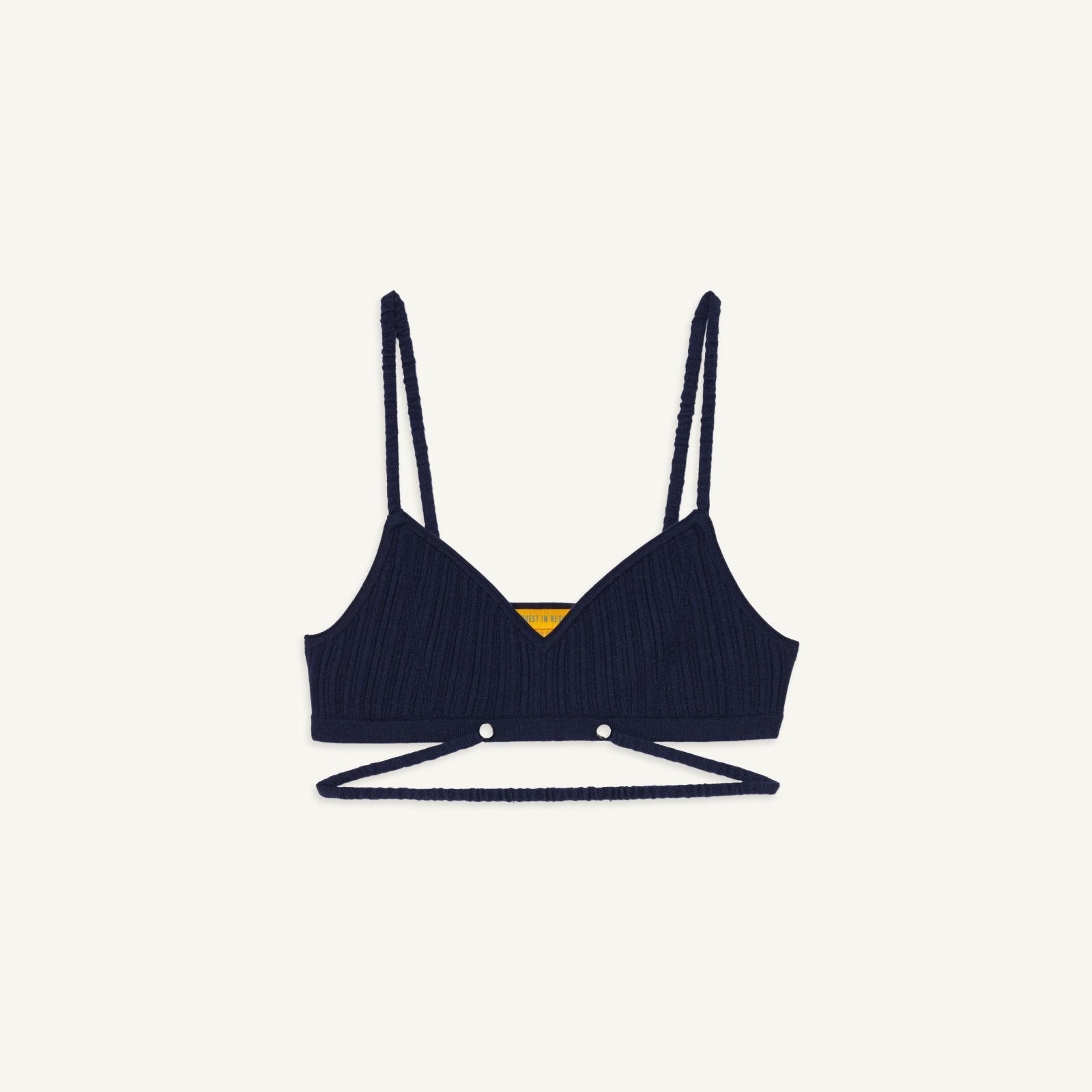 Rib Bra in navy color with adjustable straps and pearlized dome buttons.