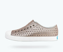 Side view of a Native Shoes Adults Jefferson Bling | Metal Bling/ Shell White Footwear
