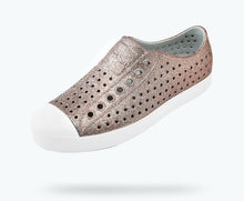 Angled view of a Native Shoes Jefferson Bling | Metal Bling/ Shell White Footwear