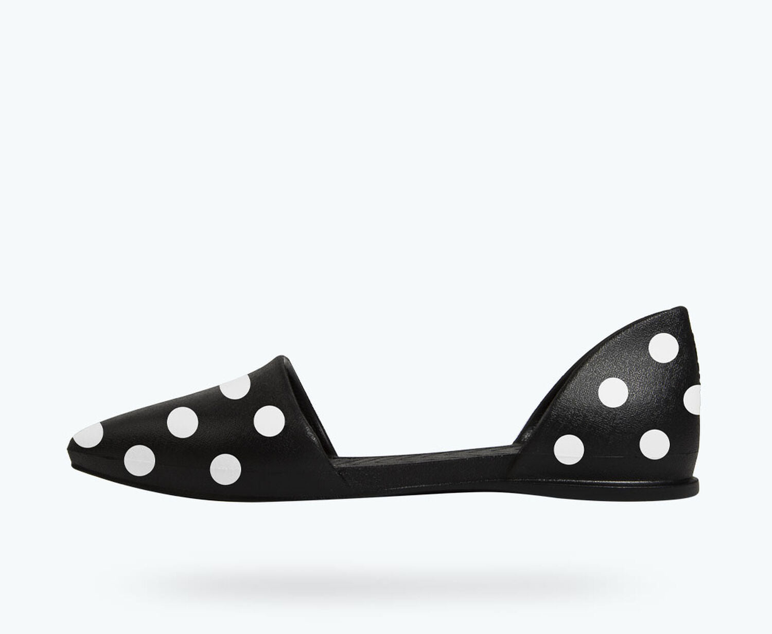 Side view of a Native Shoes Adults Audrey Print | Jiffy Black/ Shell Polka Dots Footwear