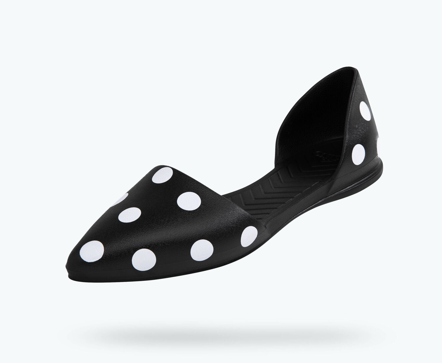 Angled view of a Native Shoes Audrey Print | Jiffy Black/ Shell Polka Dots Footwear