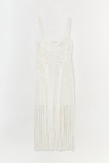 Cream sleeveless dress with curved neckline and geometric ribbed pattern throughout, featuring pleated skirt.