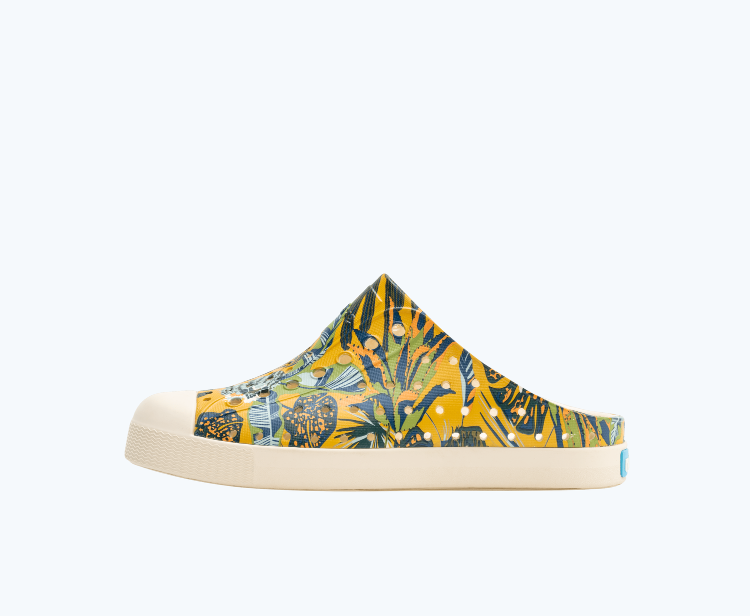 Side view of a Native Shoes Kids Jefferson Clog Print Kids | Bone White/ Bone White/ Wheat Tropic Footwear