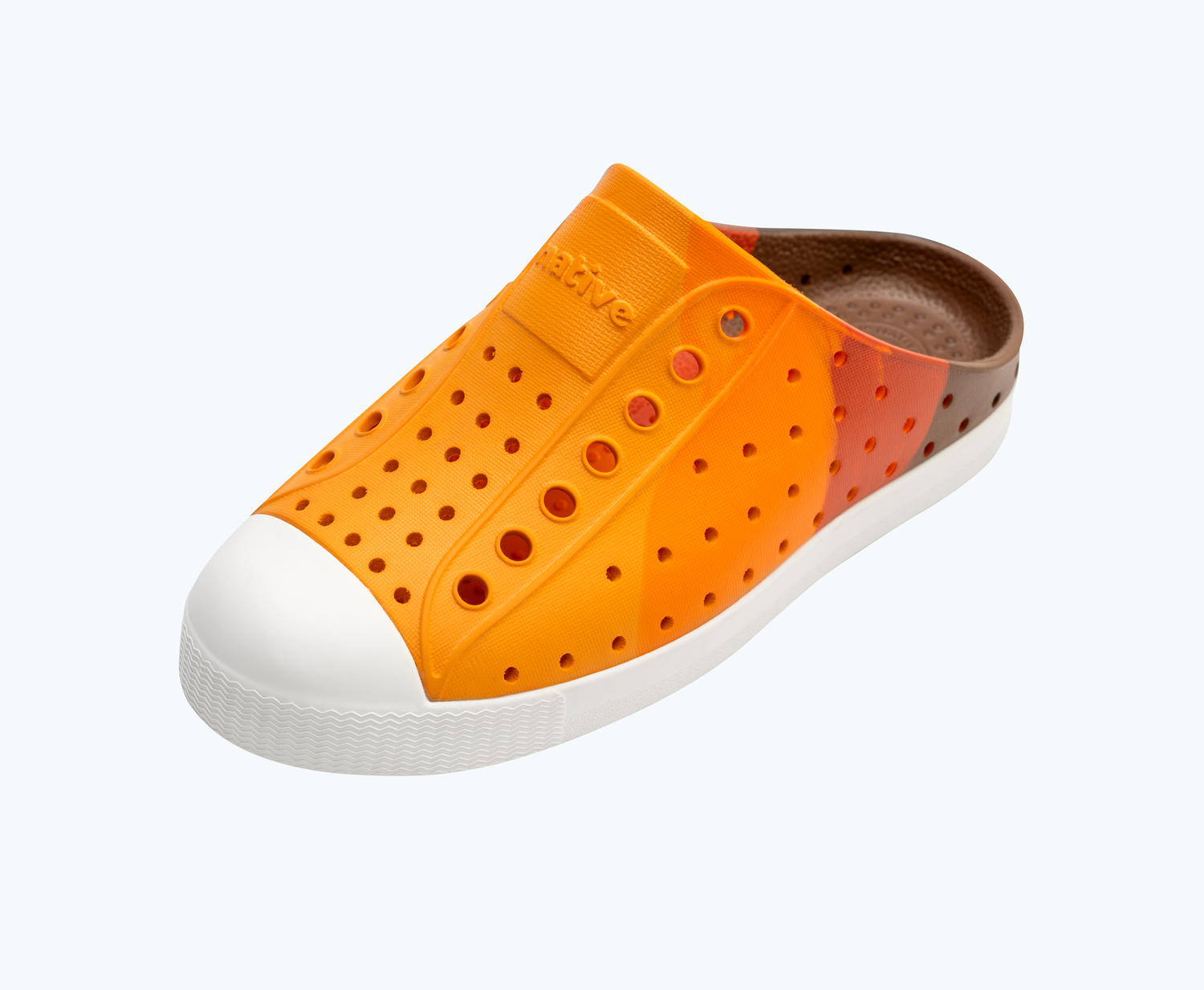 Angled view of a Native Shoes Kids Jefferson Clog Marble Kids | Sunset Roasted Marble/ Shell White Footwear