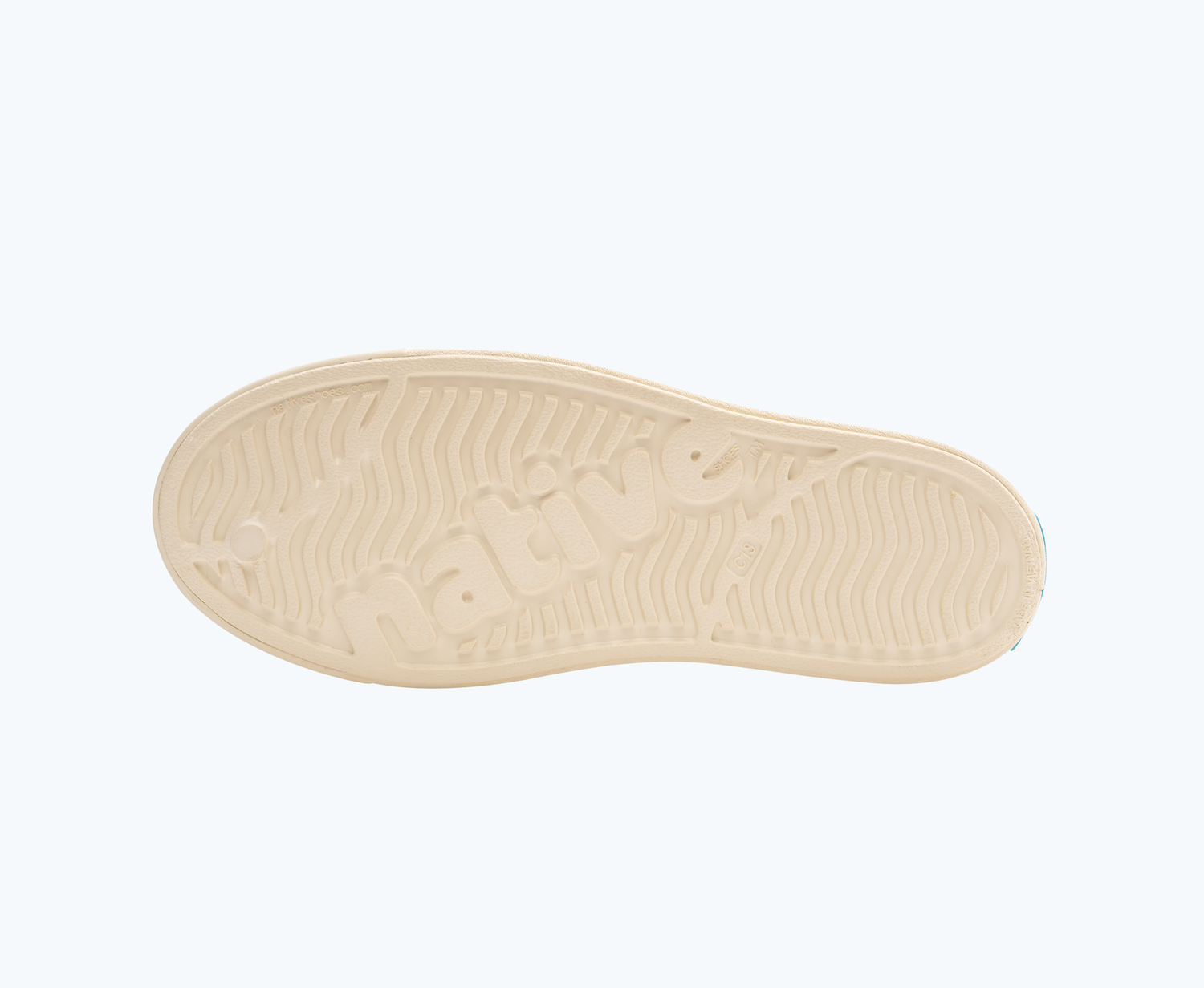 Bottom view of a Native Shoes Kids Jefferson Clog Print Kids | Bone White/ Shell White/ Seaweed Ink Tropic Footwear