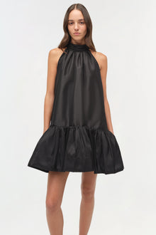 Black sleeveless halter mini dress with gathered neckline and voluminous pleated skirt.