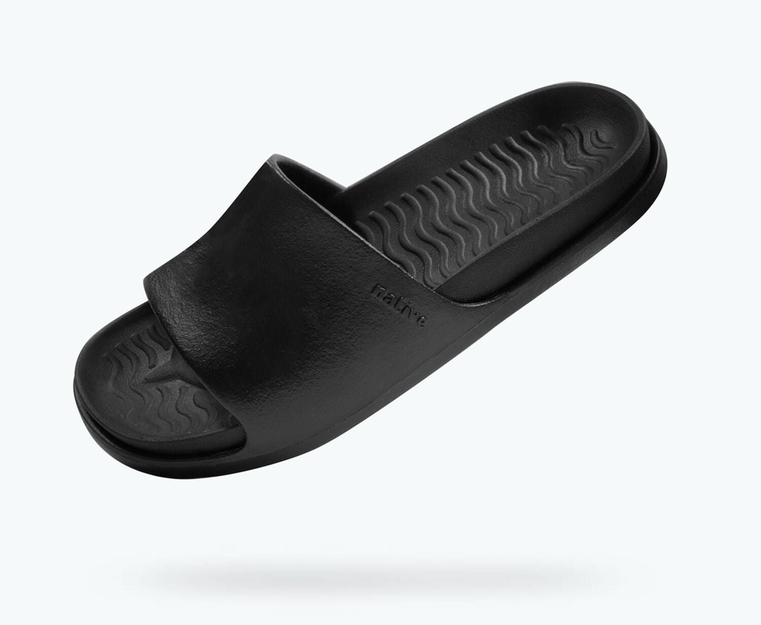 Angled view of a Native Shoes Spencer Lx | Jiffy Black/ Jiffy Black Footwear