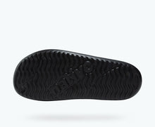 Bottom view of a Native Shoes Spencer Lx | Jiffy Black/ Jiffy Black Footwear