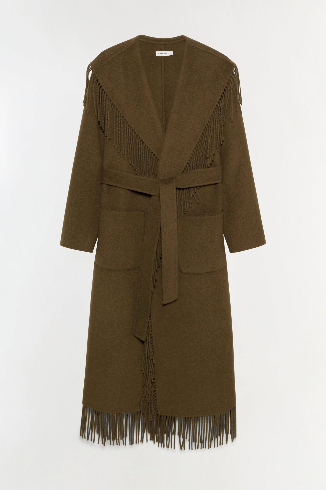 Olive-brown wool coat with wide collar, fringe trim on shoulders and hem, tied waist belt, and front pockets.