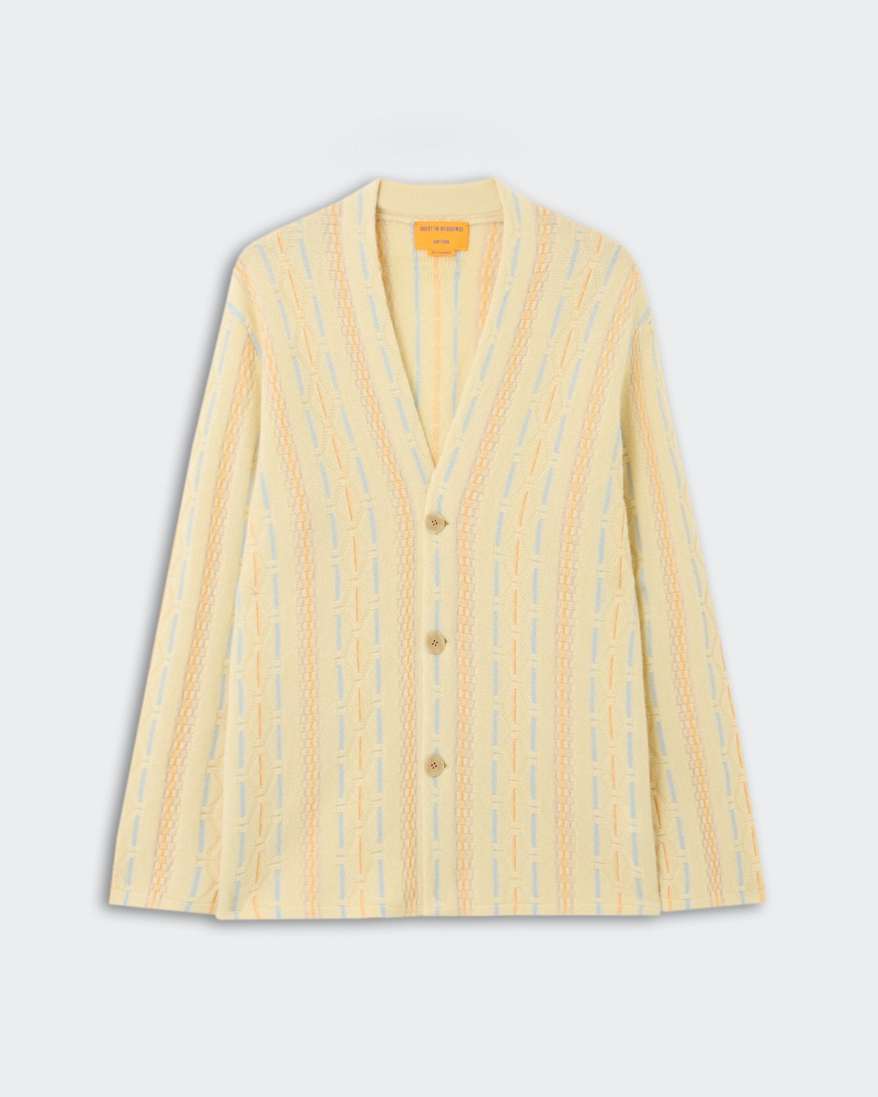 Baja Everywear Cardigan - Mist Combo, a soft knit cardigan in pale yellow with vertical multicolor stitch patterns, featuring a relaxed fit, V-neck, and front button closure, displayed flat.