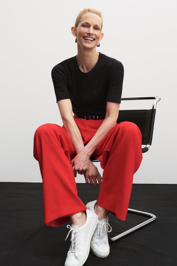 front image of a woman wearing the conway pants in maraschino | Exclude