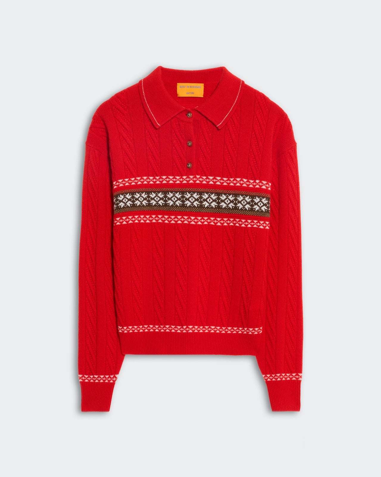 Red mid-weight cable knit polo with fairisle snowflake pattern across chest and sleeve cuffs.