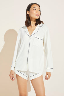 Model is wearing Gisele TENCEL Modal Long Sleeve & Shortie Short PJ Set in Ivory/Navy.