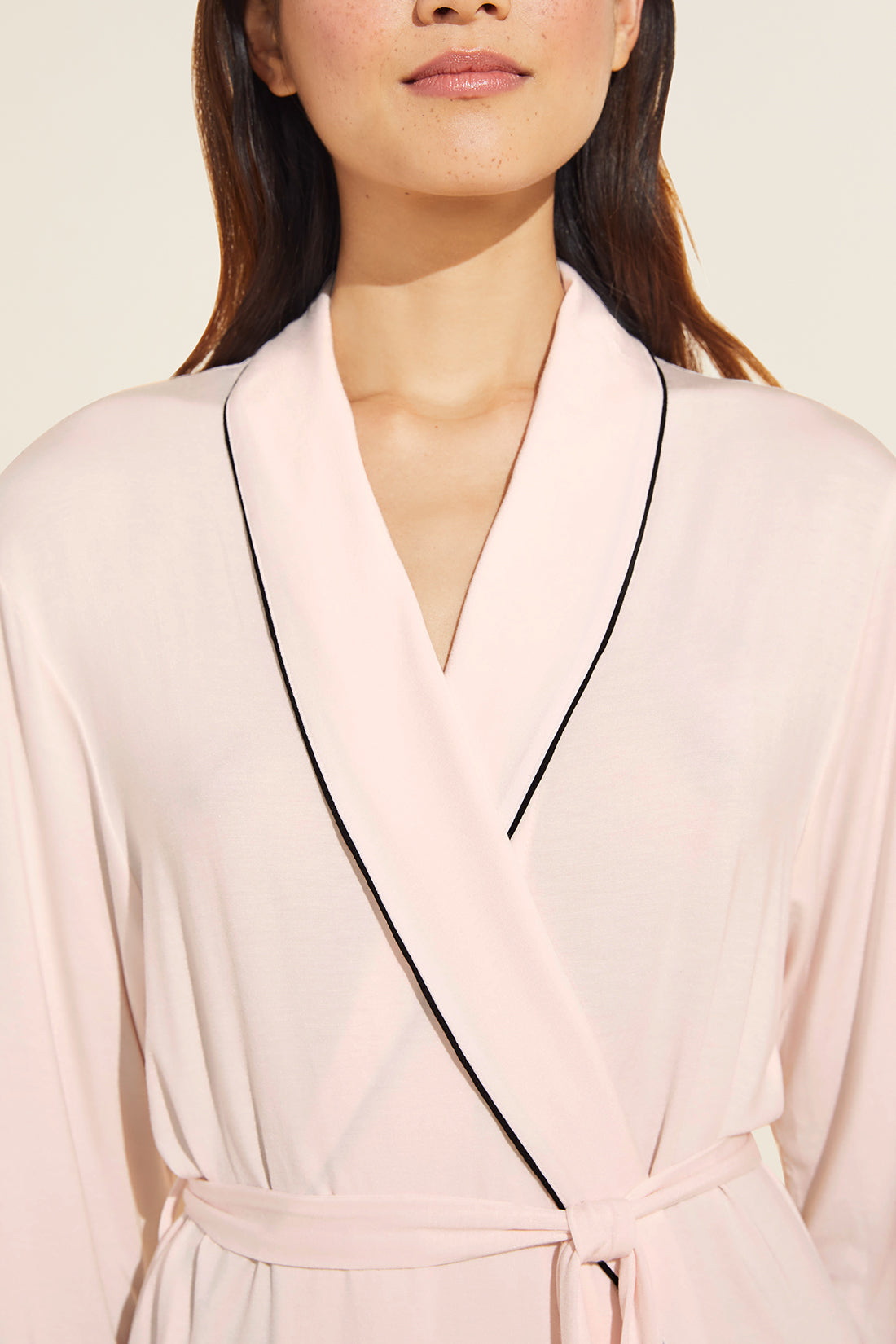 Model is wearing the Gisele TENCEL Modal Robe in sorbet pink/black.