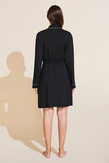 Model is wearing the Gisele TENCEL Modal Robe in Black/Sorbet Pink.