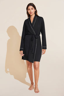 Model is wearing the Gisele TENCEL Modal Robe in Black/Sorbet Pink.