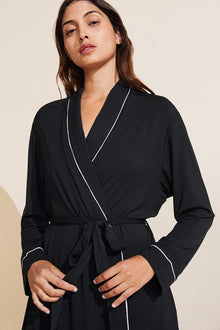 Model is wearing the Gisele TENCEL Modal Robe in Black/Sorbet Pink.