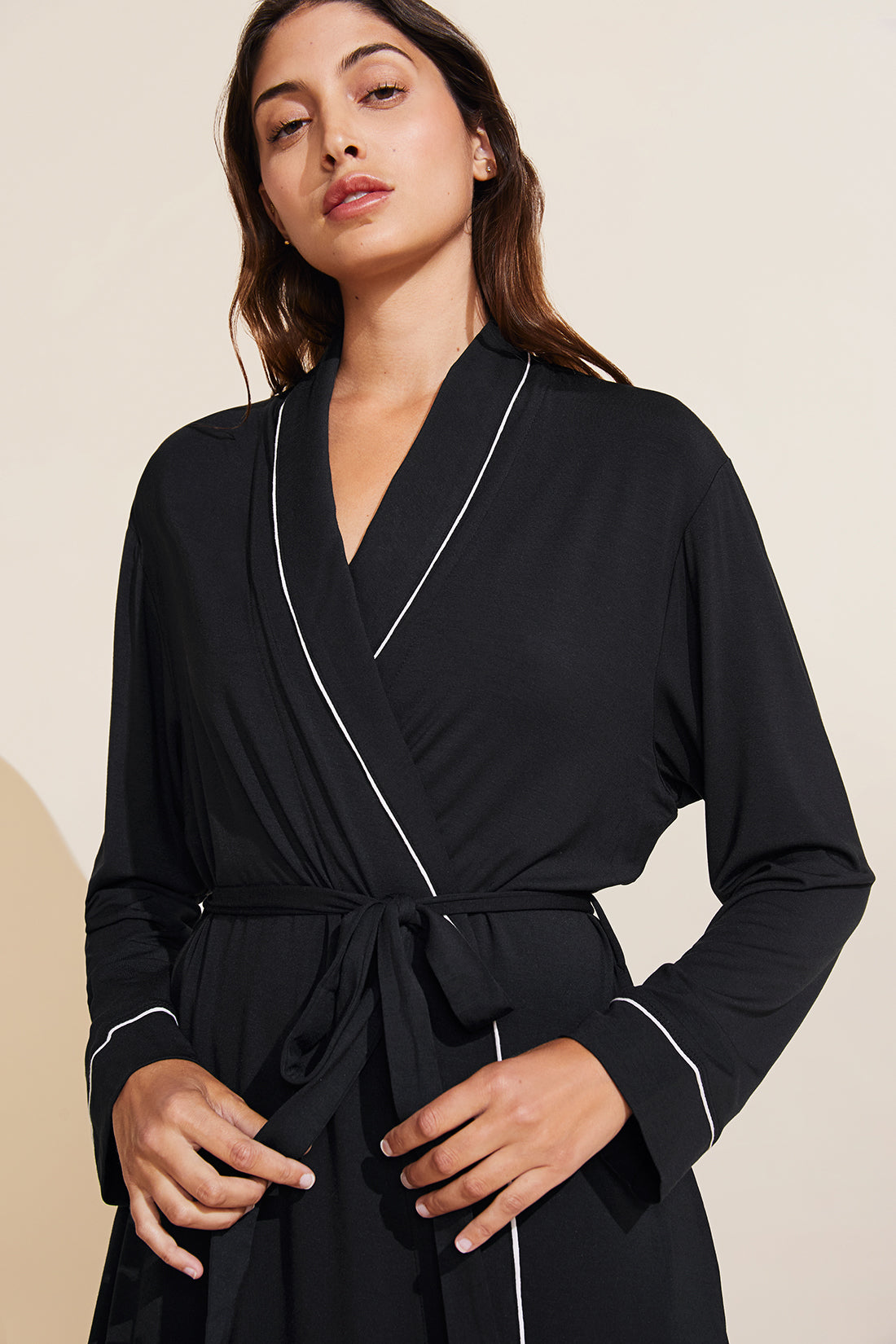 Model is wearing the Gisele TENCEL Modal Robe in Black/Sorbet Pink.