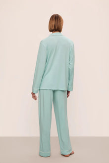 Model is wearing Gisele Tencel Modal Long Pj Set in Canal Blue/Ivory