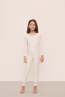Model is wearing Kids Printed TENCEL Modal Unisex Long PJ Set in Heritage Stripe Light Heather Grey/Peppercorn