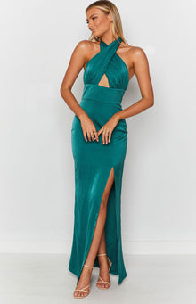 Side view of a peacock formal dress with a criss-cross halter neckline, front cutout, fitted waist, high thigh split, and open back