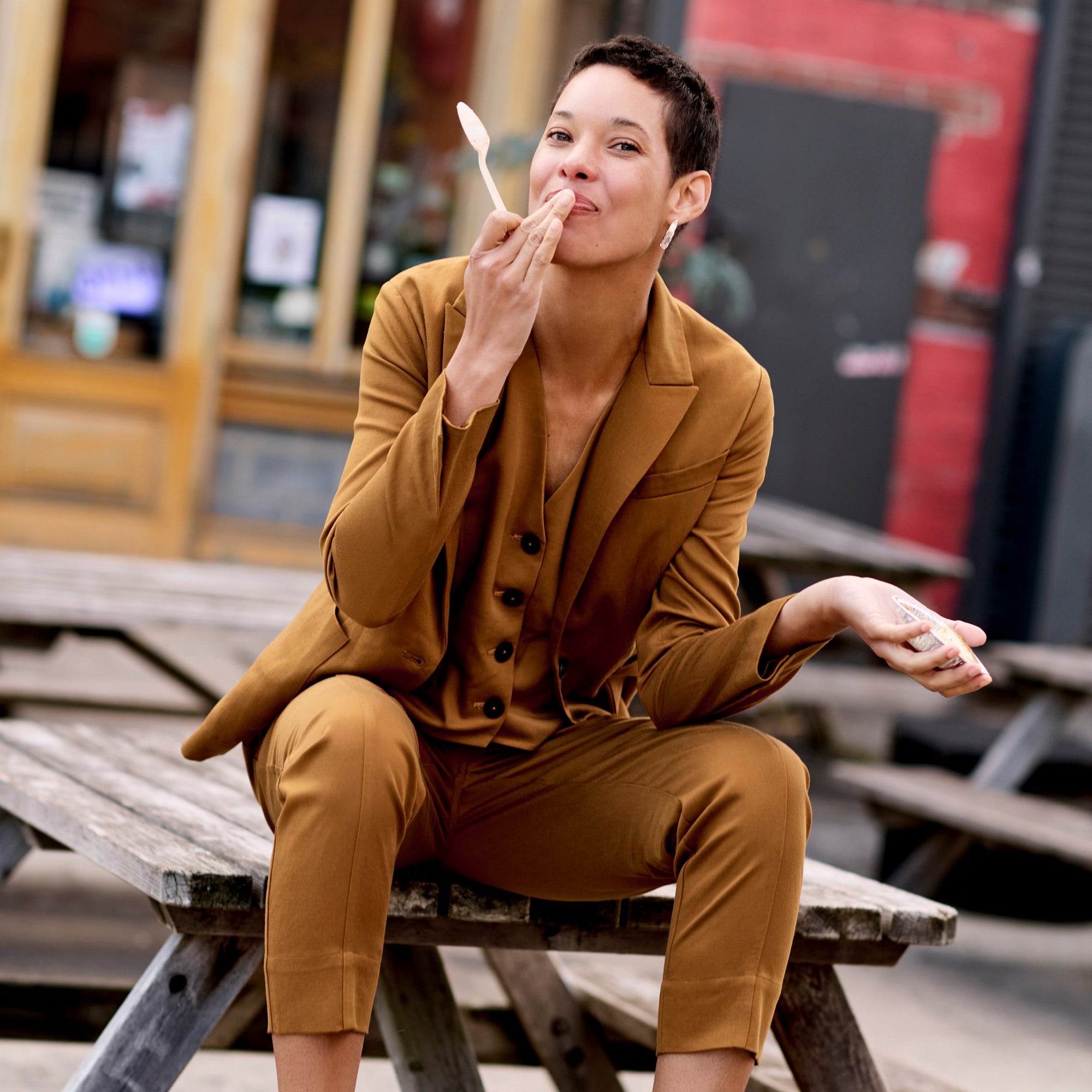 Front image of a woman wearing the Shane Pant in Acorn