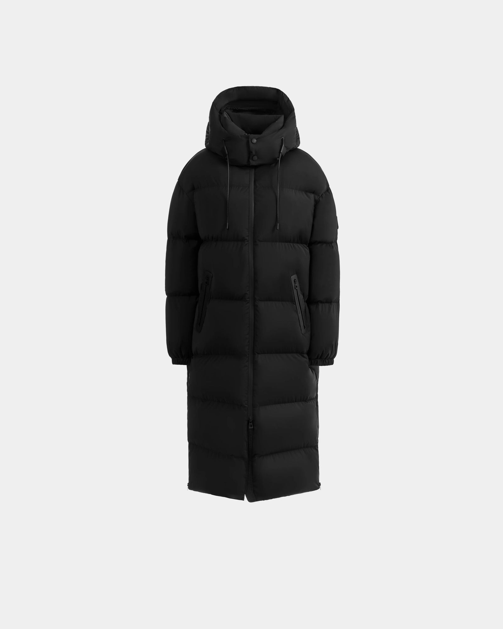 A winter essential, the Rudsak KARLEE XL - 8125683 Black women’s long maxi down puffer jacket features a hood, front zipper, snap buttons, and two zippered pockets for extreme cold-weather performance.