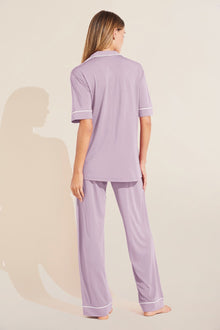 Model wears Gisele TENCEL Modal Short Sleeve & Pant PJ Set in lavender/ivory.