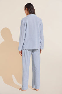 Model is wearing Nautico Long PJ Set in Wedgewood Blue/White.