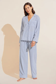 Model is wearing Nautico Long PJ Set in Wedgewood Blue/White.