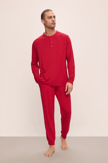 Model wears Henry TENCEL Modal Long PJ Set in Haute Red.