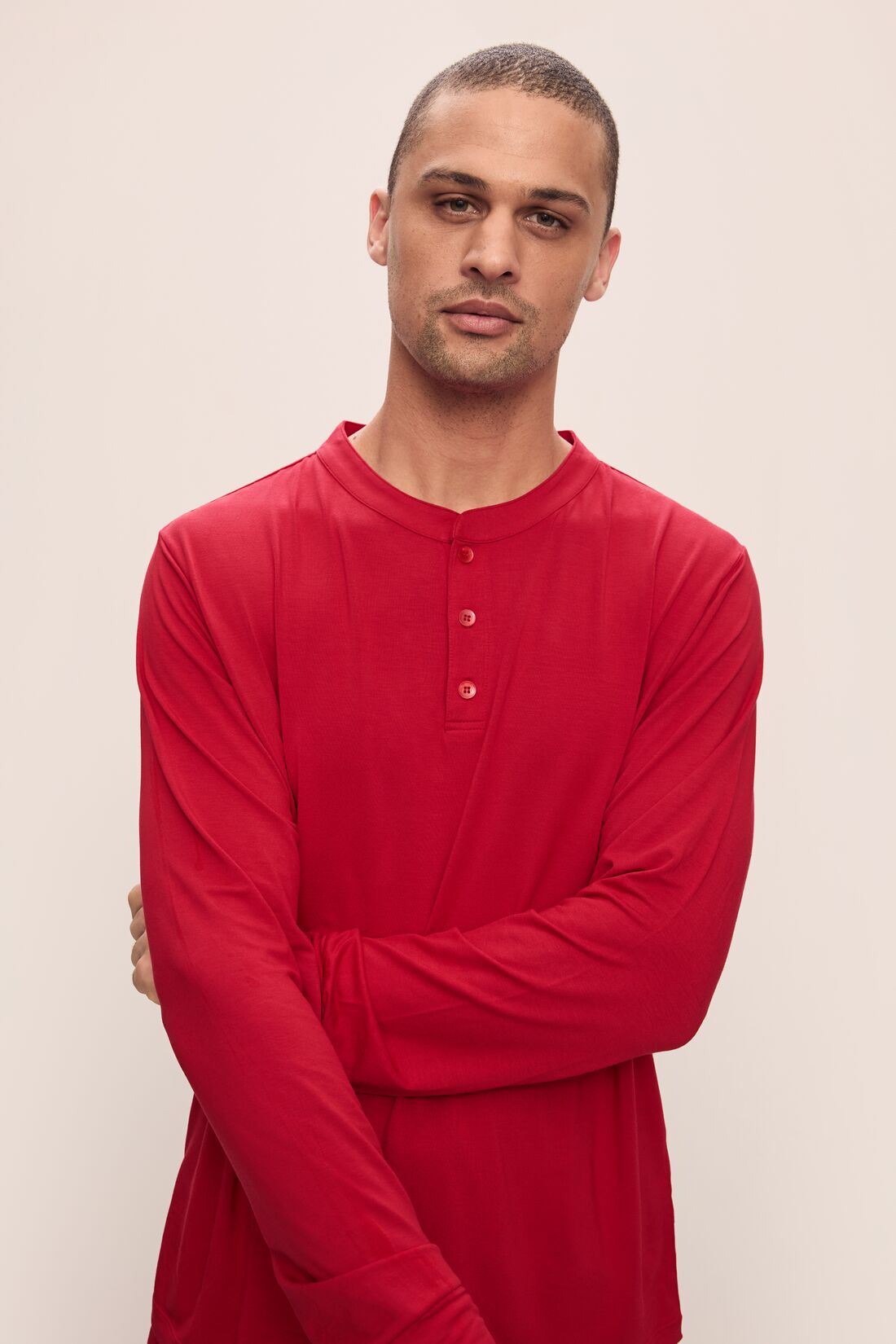 Model wears Henry TENCEL Modal Long PJ Set in Haute Red.