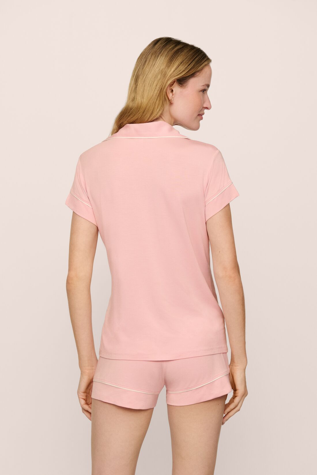Model is wearing the Gisele TENCEL Modal Shortie Short PJ Set in Silver Pink/Ivory