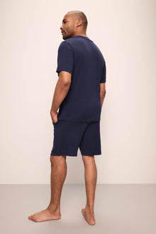 Model wears Henry TENCEL Modal Rib Short PJ Set in True Navy.