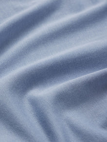Model wears Gisele TENCEL Modal Short Sleeve Cropped PJ Set in wedgewood blue/ivory.