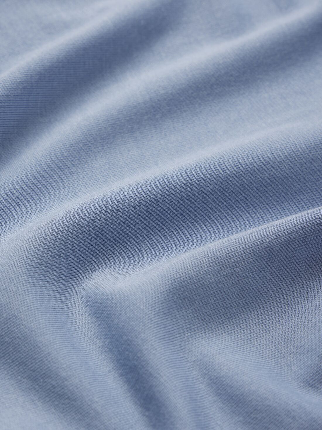 Model wears Gisele TENCEL Modal Short Sleeve Cropped PJ Set in wedgewood blue/ivory.