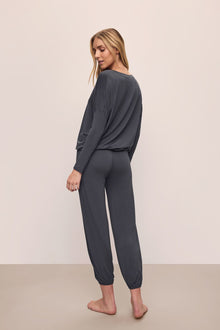 Model wears Gisele TENCEL Modal Slouchy PJ Set in Graphite/Ivory.
