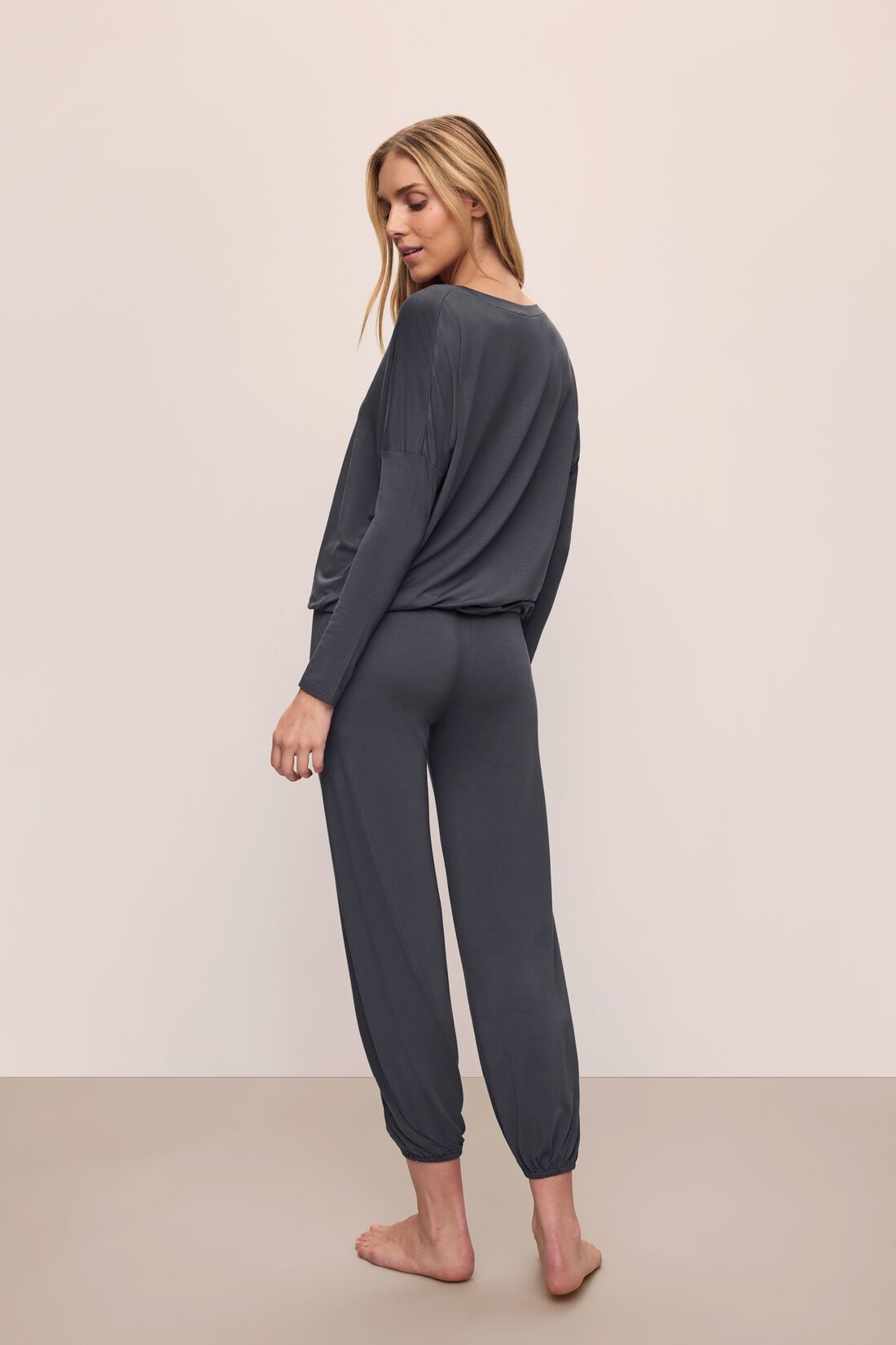 Model wears Gisele TENCEL Modal Slouchy PJ Set in Graphite/Ivory.