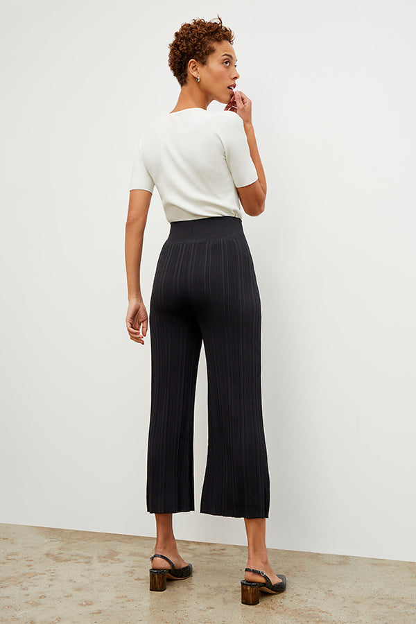 Back image of a woman wearing the Marijane Pant - Textured Knit in Black | Exclude