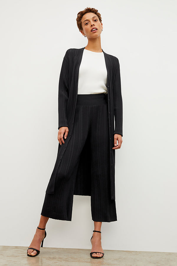 Front image of a woman wearing the Marijane Pant - Textured Knit in Black | Grid Hover | Exclude