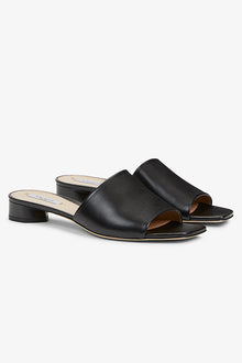 Packshot image of the Carter Slide - Kidskin in Black | Grid | Exclude | Still