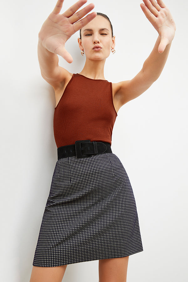 Front image of a woman wearing the whitney skirt in black and white | Exclude | Grid Hover