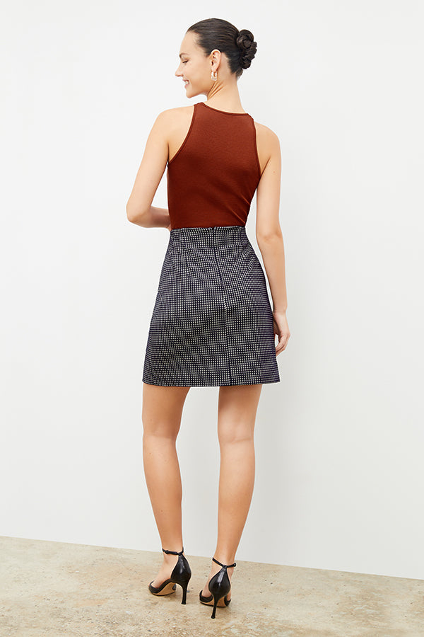 Back image of a woman wearing the whitney skirt in black and white | Exclude