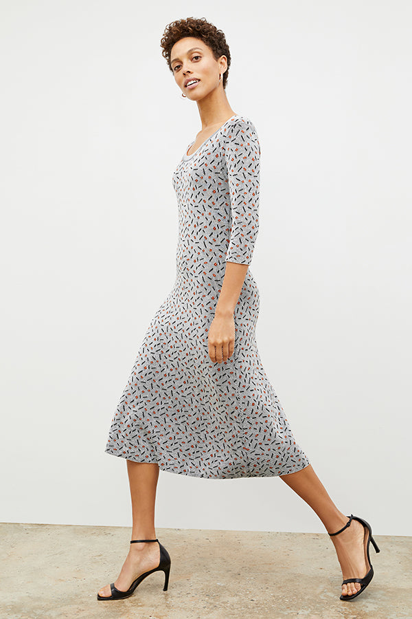 Front image of a woman wearing the Tippy Dress in Brick and Black | Exclude