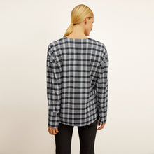 back image of a woman wearing the tully top in checkmate