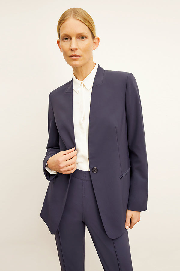 Front image of a woman standing wearing the Lagarde Shirt—Soft Wave in Alabaster | Exclude