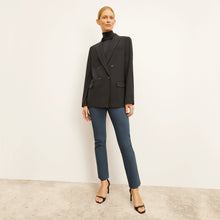 front image of a woman wearing the foster pant in lakeside