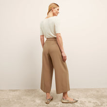 back image of a woman wearing the charlie top in ivory