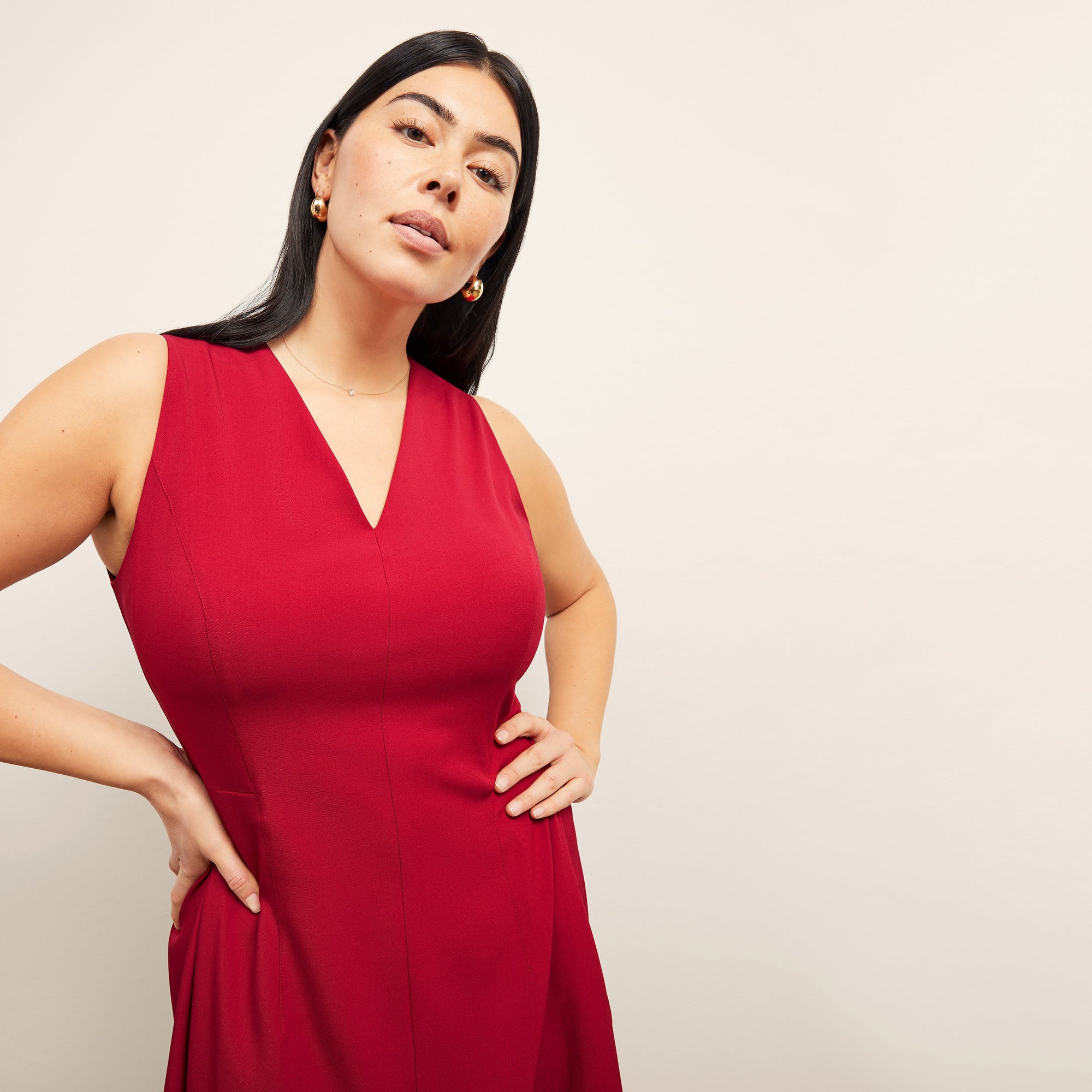 front image of a woman wearing the jaycie dess in rhubarb