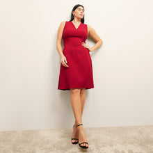 front image of a woman wearing the jaycie dess in rhubarb